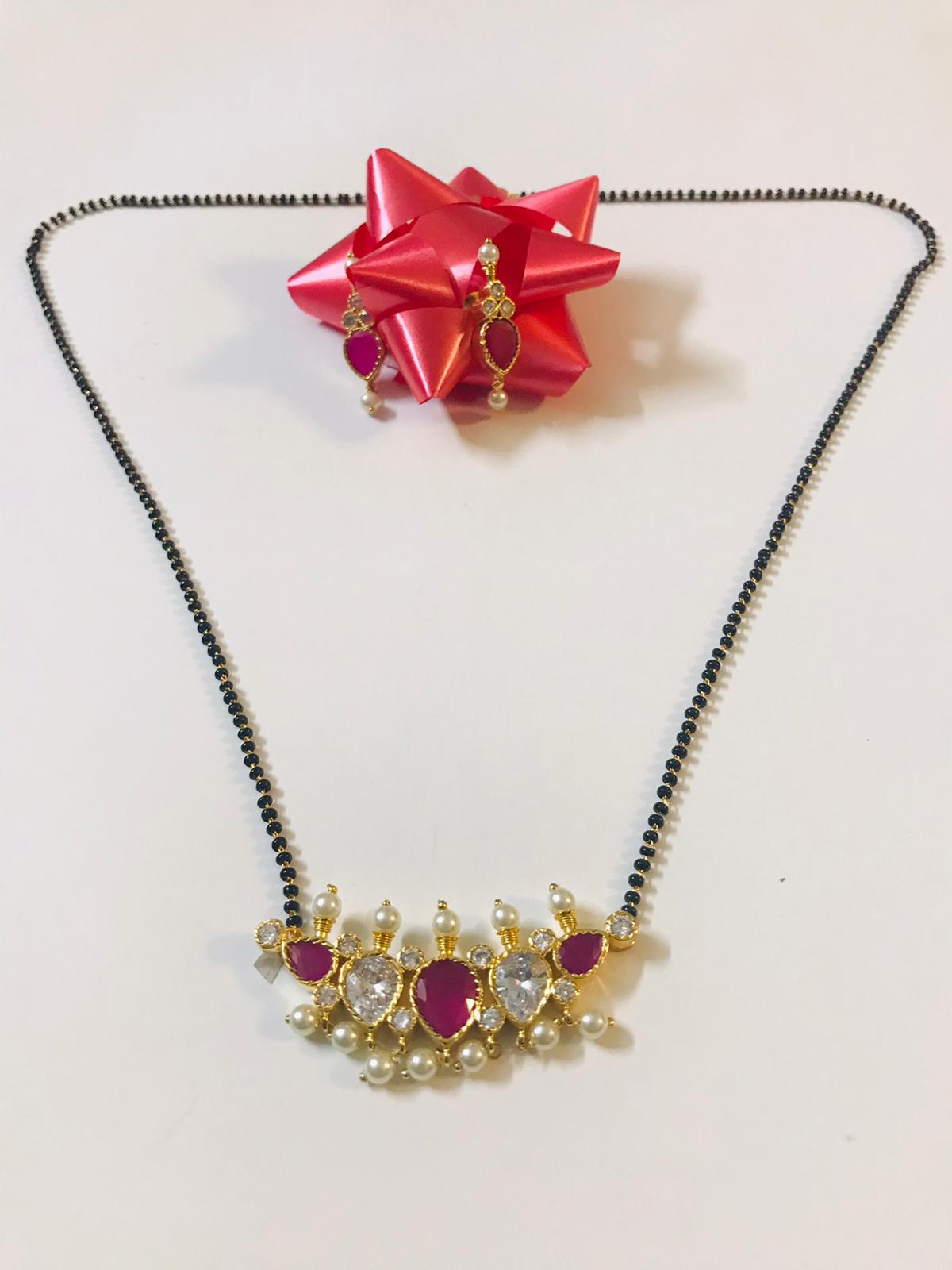 Mangalsutra Necklace Set (available with pink or green stones) Mangalsutra Necklace Set (available with pink or green stones)