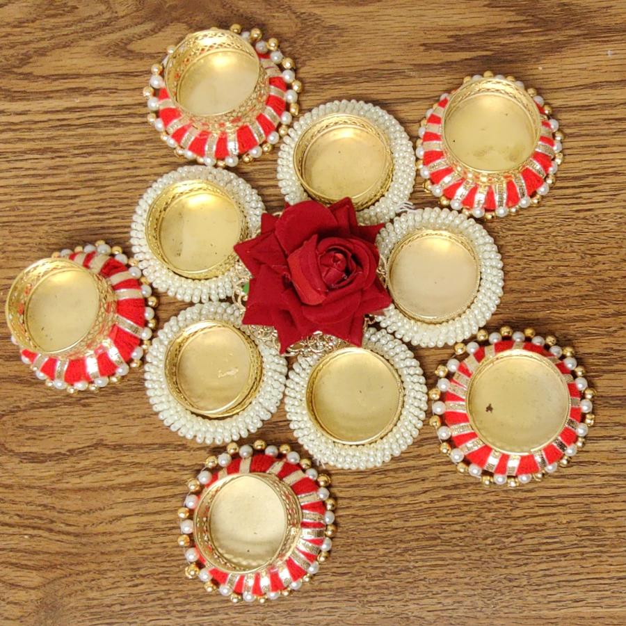 Diwali special - Antique white and red floor decoration Diwali special - Antique white and red floor decoration