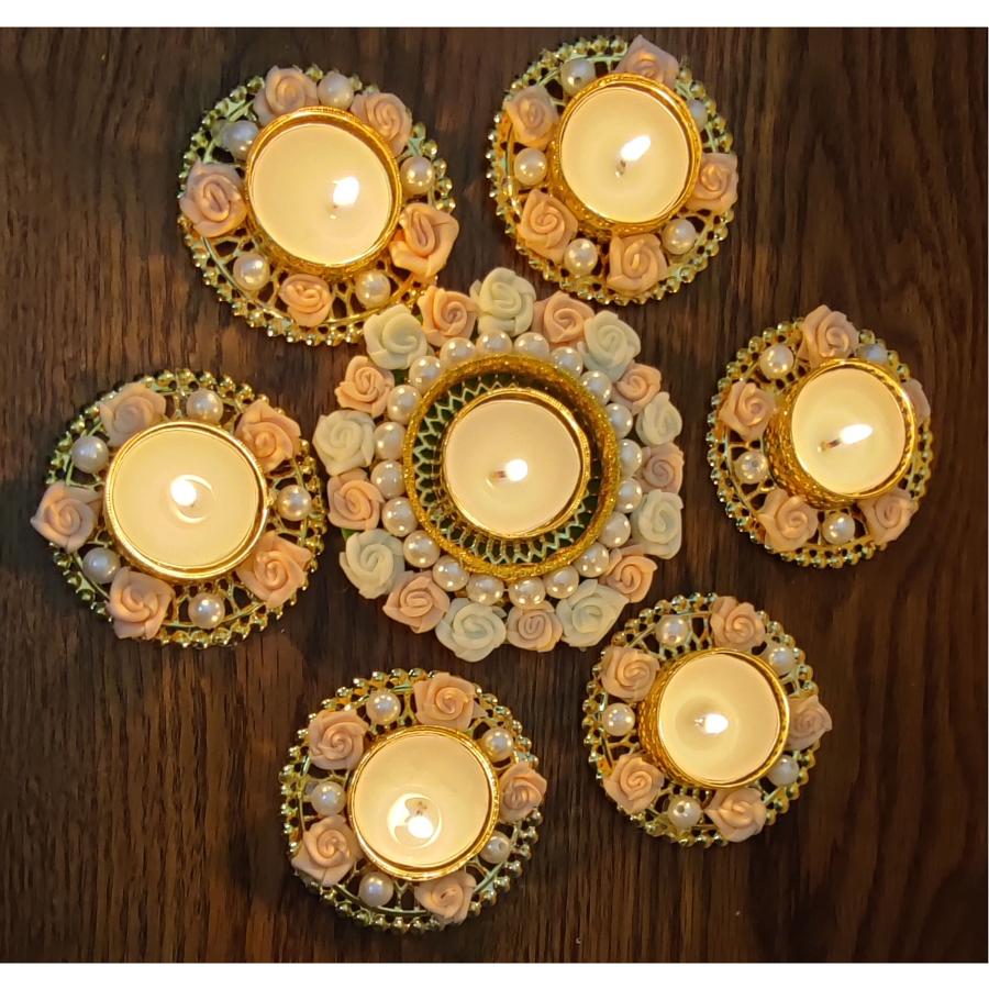 Diwali special - Antique white and pink floor rangoli with pearls Diwali special - Antique white and pink floor rangoli with pearls