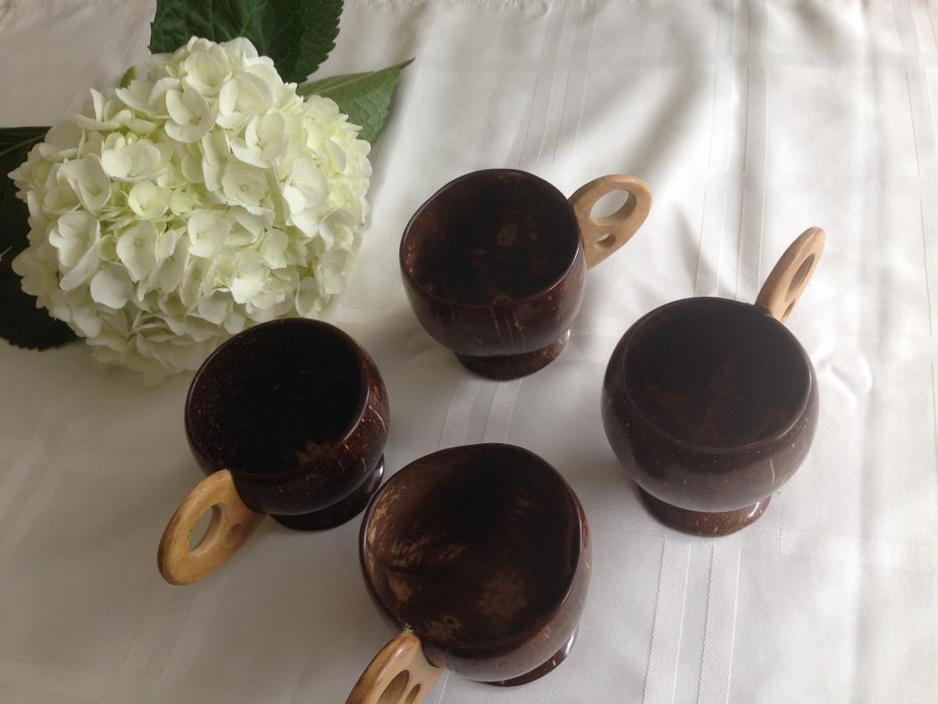 Natural organic hand made coconut shell tea cups set of four Natural organic hand made coconut shell tea cups set of four