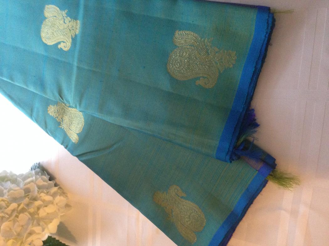 Kancheepuram silk saree full body and peacock jari putta with blue pallu 