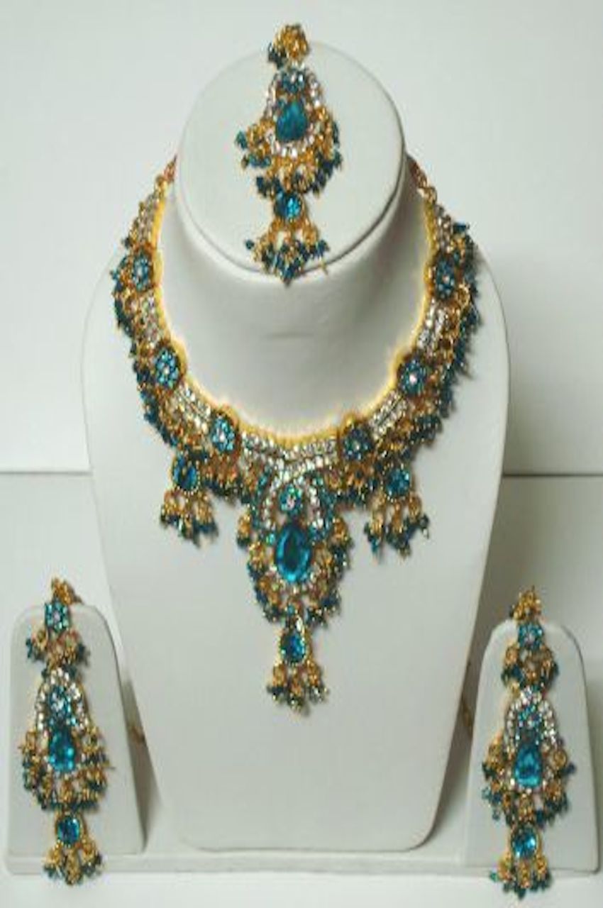 Blue heavy stones & Gold Color Stone Studded Pendant Set Blue heavy stones & Gold Color Stone Studded Pendant Set