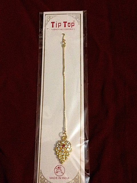 Gold color Indian mang tika with clear stones