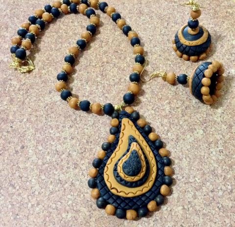 Hand Carved Designer Clay Set in Shades of Golden Brown & Black Hand Carved Designer Clay Set in Shades of Golden Brown & Black