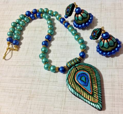 Lovely peacock Feather Terracotta Set with Matching Jhumkas!!!!! Lovely peacock Feather Terracotta Set with Matching Jhumkas!!!!!