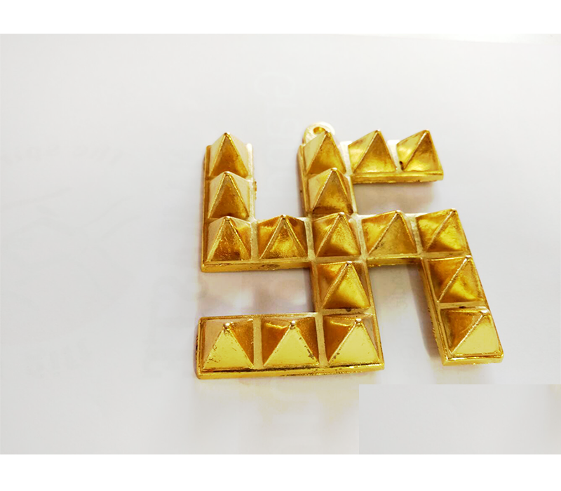 Golden colored swastika yantra swastik pyramid yantra Golden colored swastika yantra swastik pyramid yantra