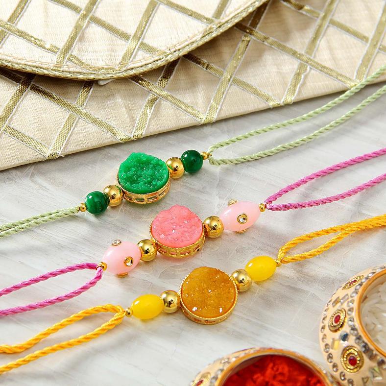 Three Colorful Stone Rakhi with Gota Work Envelope