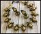 Terracotta Antique Choker Set \w Medium Sized jhumkas in Gold & Black Terracotta Antique Choker Set \w Medium Sized jhumkas in Gold & Black