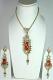 Fancy Orange & Gold Color Stone Studded Pendant Set Fancy Orange & Gold Color Stone Studded Pendant Set