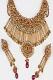 Maroon & Golden Color Stone Studded Necklace Set Maroon & Golden Color Stone Studded Necklace Set