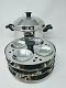 Tabakh Multi Purpose 4-Rack Stainless Steel Idli Cooker With Stand (Small) Tabakh Multi Purpose 4-Rack Stainless Steel Idli Cooker With Stand (Small)
