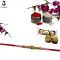 Diamond RAKHI Designed With Golden and Pink Beads W/ Roli & Chaval Diamond RAKHI Designed With Golden and Pink Beads W/ Roli & Chaval