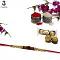 Traditional RAKHI Crafted in Gold W/ Rudraksha & beads + Roli & Chaval Traditional RAKHI Crafted in Gold W/ Rudraksha & beads + Roli & Chaval