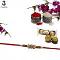 Golden Om pended Rakhi W/ Traditional Handcrafted Ornaments + Roli & Chaval