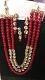 Red Pearls Kundan Necklace Set With Necklace, Earrings & Tikka Red Pearls Kundan Necklace Set With Necklace, Earrings & Tikka