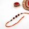 3 Rudraksha Seeds Rakhi In A Multi-Toned Thread 3 Rudraksha Seeds Rakhi In A Multi-Toned Thread