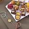 Assorted 12 pcs. Premium Mithai with Rakhi Bracelet Assorted 12 pcs. Premium Mithai with Rakhi Bracelet