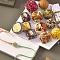 Pastal Meena Rakhi with 12 pcs. Assorted Sweets