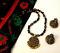 Black & Gold Embossed Pendant Set /w Jhumka Earrings Black & Gold Embossed Pendant Set /w Jhumka Earrings