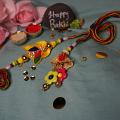 Colorful Lumba Bhaiya Bhabhi Rakhi + Roli & Chaval Colorful Lumba Bhaiya Bhabhi Rakhi + Roli & Chaval