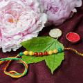 Colorful Beads Rakhi W\ Multicolor Yarn + Roli and Chaval