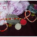 Diamond Flower Rakhi With illuminating Beads and Roli + Chaval