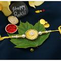Beautiful yellow Flower Rakhi Surrounded By Diamonds+ Roli/Chaval