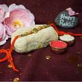 Golden RAKHI With Om on The Center Bead + Roli & Chaval