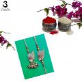 Lustrous Lumba Bhaiya Bhabhi Zardosi Rakhi on Polished Stone +Roli & Chaval Lustrous Lumba Bhaiya Bhabhi Zardosi Rakhi on Polished Stone +Roli & Chaval
