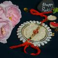Beautiful Red Gem Rakhi With Beads + Roli & Chaval Beautiful Red Gem Rakhi With Beads + Roli & Chaval