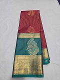 Maroon/burgundy with teal antique gold zari border Maroon/burgundy with teal antique gold zari border