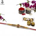Designer RAKHI In Gold W/ American Diamonds and White Beads + Roli & Chaval