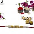 Traditional RAKHI in Gold W/ Diamonds and White Beads + Roli & Chaval Traditional RAKHI in Gold W/ Diamonds and White Beads + Roli & Chaval
