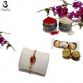 Blissful Rakhi W/ Ruby Like Stone Surrounded W/ Diamonds + Roli & Chaval Blissful Rakhi W/ Ruby Like Stone Surrounded W/ Diamonds + Roli & Chaval