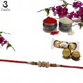 Golden Om pended Rakhi W/ Traditional Handcrafted Ornaments + Roli & Chaval