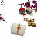 Classy RAKHI W/ an Embedded Ruby Like Stone W/ Golden Craft + Roli & Chaval