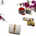 Appealing Diamond Crafted Golden Jewel Rakhi + Roli & Chaval Appealing Diamond Crafted Golden Jewel Rakhi + Roli & Chaval