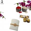 Lustrous Diamond W/ Gold Rajasthani Om Pendants Rakhi + Roli & Chaval Lustrous Diamond W/ Gold Rajasthani Om Pendants Rakhi + Roli & Chaval