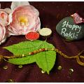 Delightful Rakhi Made With Luminous Pearls which comes with Roli + Chaval Delightful Rakhi Made With Luminous Pearls which comes with Roli + Chaval