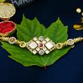 Alluring Kundan Rakhi With Sparkling Diamonds + Roli & Chaval Alluring Kundan Rakhi With Sparkling Diamonds + Roli & Chaval