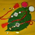 Simple Kundan Rakhi Surrounded by a Diamond Ring For Bhaiya Bhabhi