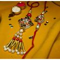 Beautiful White Stone Kundan Bhaiya Bhabhi Rakhi + Roli & Chaval Beautiful White Stone Kundan Bhaiya Bhabhi Rakhi + Roli & Chaval