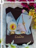Gift Set W/ Rajasthani Om Pendants Rakhi + Roli, Chaval, Card, Chocolates 