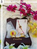 Rakhi Gift Hamper w/ Om Mina Rakhi + Roli, Chaval, Card, Chocolates & Love Rakhi Gift Hamper w/ Om Mina Rakhi + Roli, Chaval, Card, Chocolates & Love
