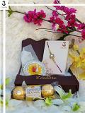 Gift Hamper W/ Crystal Rakhi Embraced by Gold+Roli, Chaval, Card, Chocolate