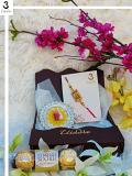 Gift Hamper W/ Ruby Stone rakhi + Roli, Chaval, Card, Chocolates & Love Gift Hamper W/ Ruby Stone rakhi + Roli, Chaval, Card, Chocolates & Love