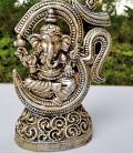 Ganesha Statue Seated in Omnipresent Om in Gold Finish 7" Ganesha Statue Seated in Omnipresent Om in Gold Finish 7"