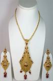 Maroon Golden Color Polki Studded Necklace Set