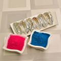 Send Holi Gift Hamper to India - Relishing Kaju Gujiya with Pink & Purple Gulaal