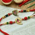 Metal Dial Leaf Designed Ganesha Rakhi Set of 2 Metal Dial Leaf Designed Ganesha Rakhi Set of 2